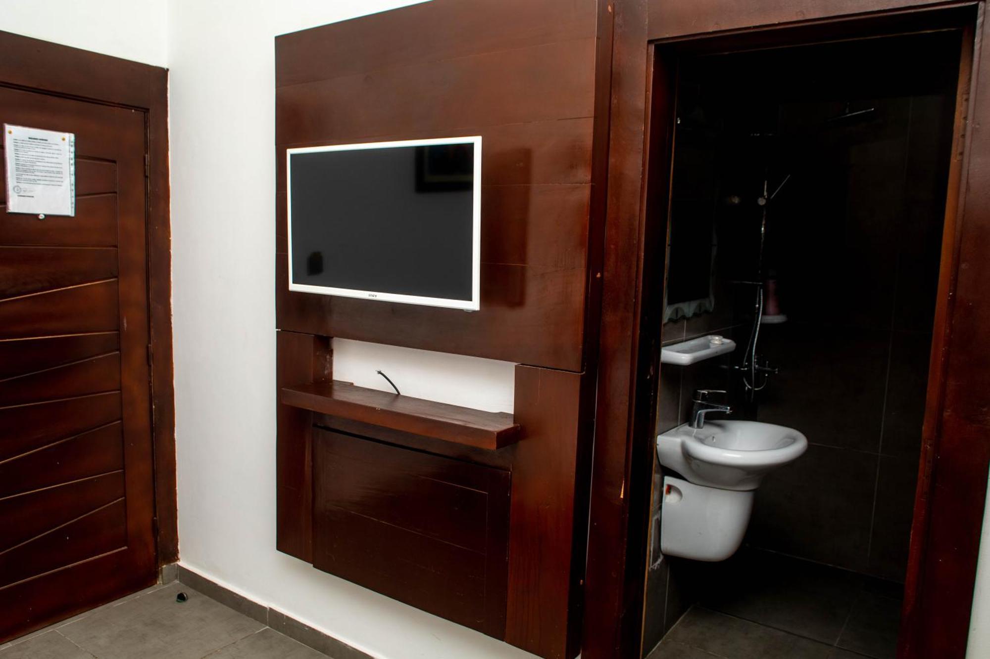 Hotel Les Orchidees Cotonou Oda fotoğraf
